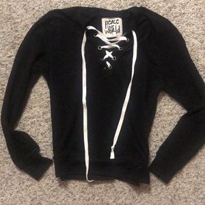 Peace Love World sweatshirt in black.